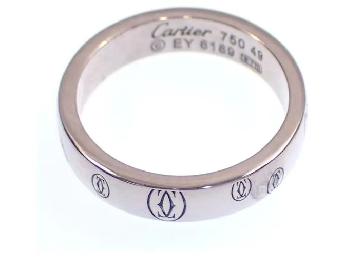 Anillo Cartier Feliz Cumpleaños en oro blanco de 18K 