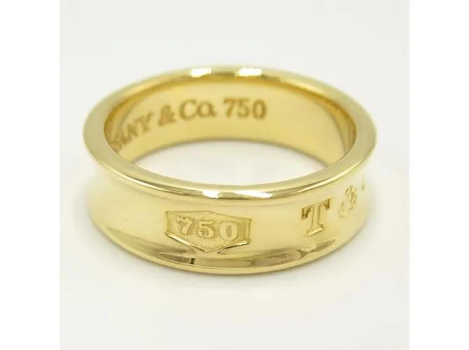 Anillo Tiffany & Co. 1837 en oro amarillo de 18K Dorado 