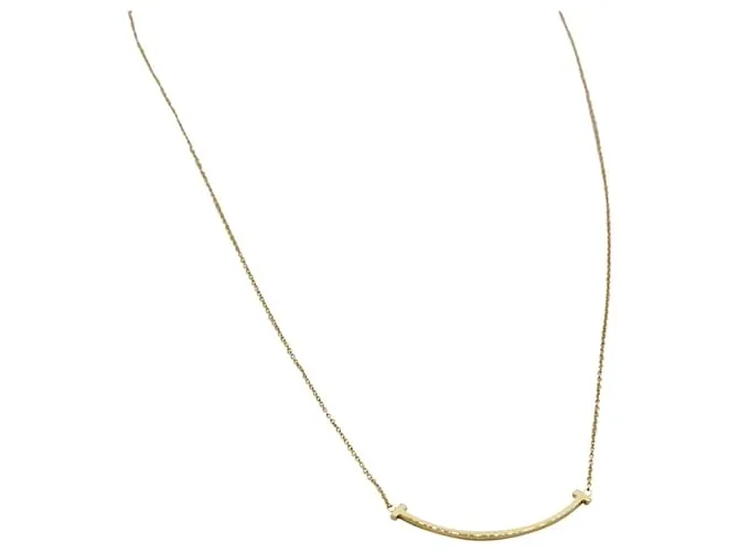 Colgante Tiffany & Co T Smile en oro amarillo Dorado 