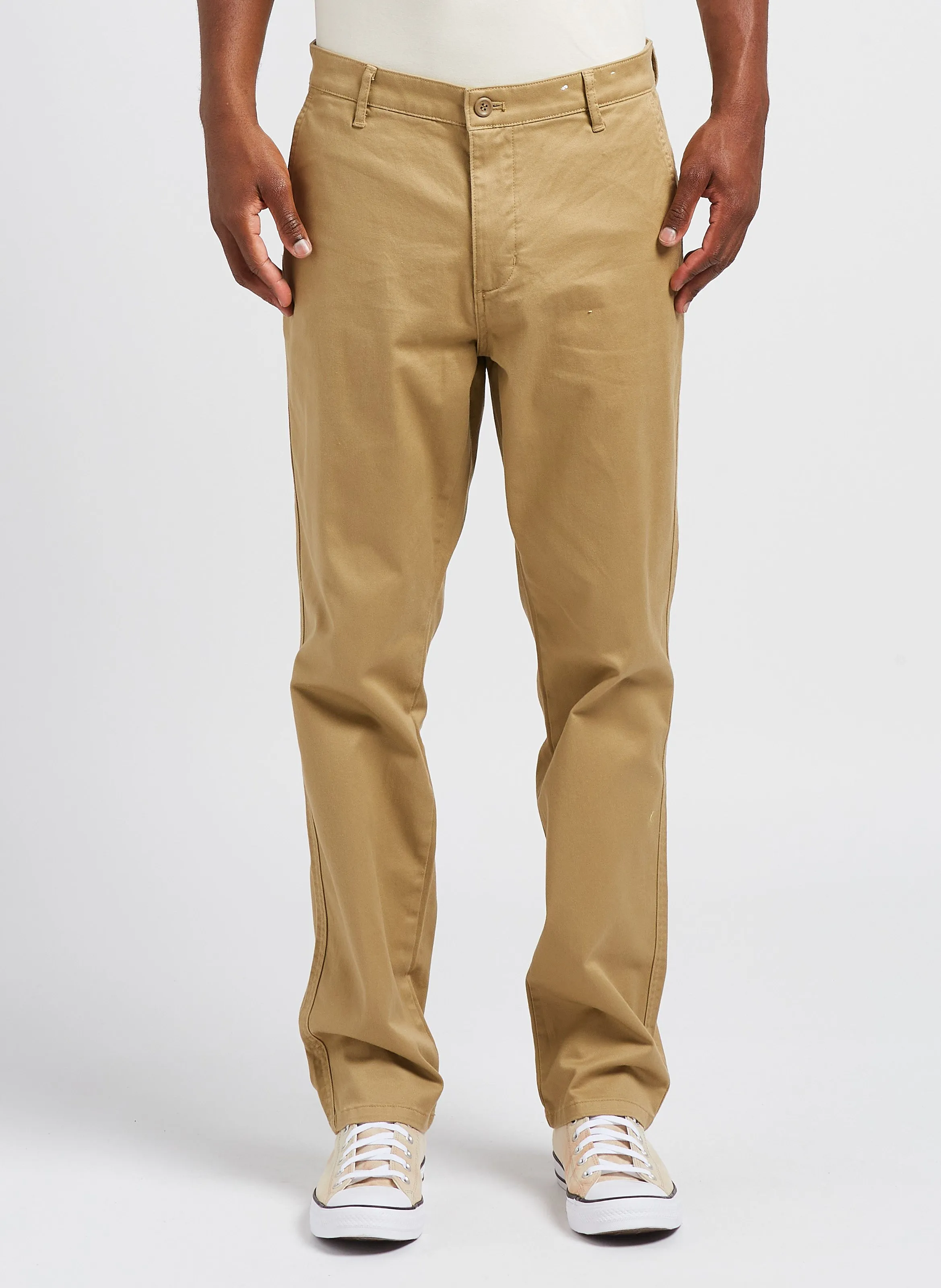 Pantalón chino slim fit de algodón elástico en dorado