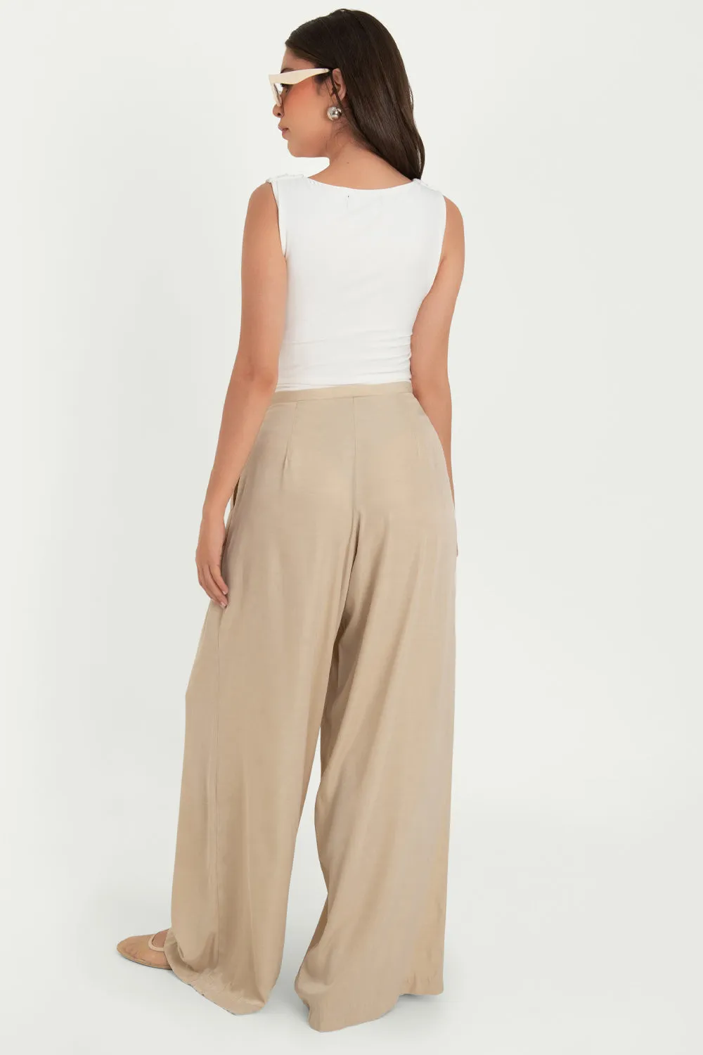 Pantalón de fit palazzo con plisados cintura alta