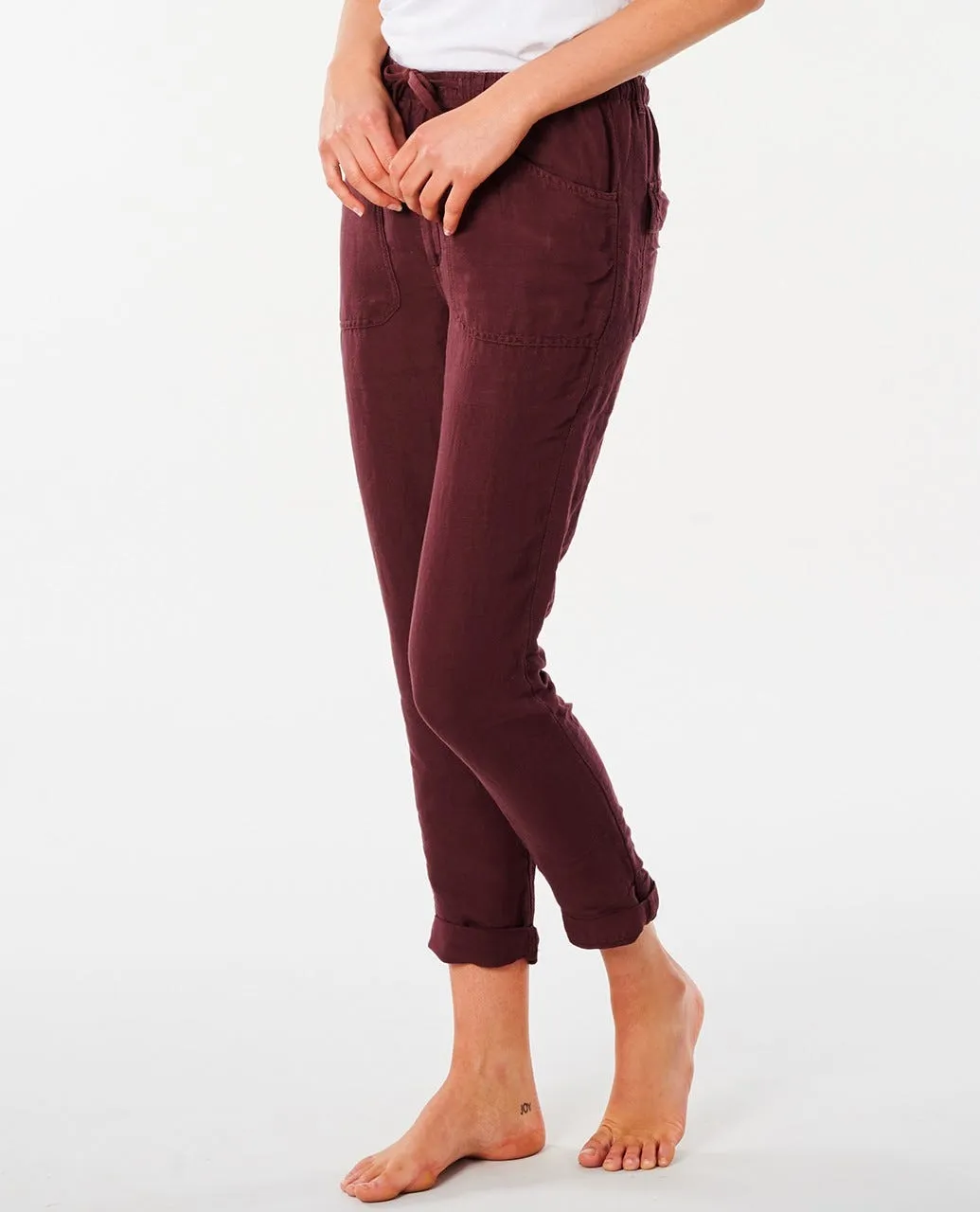 Pantalón fluido RIP CURL práctico y cómodo para Mujer Panoma Maroon Ref. GPABN9 granate