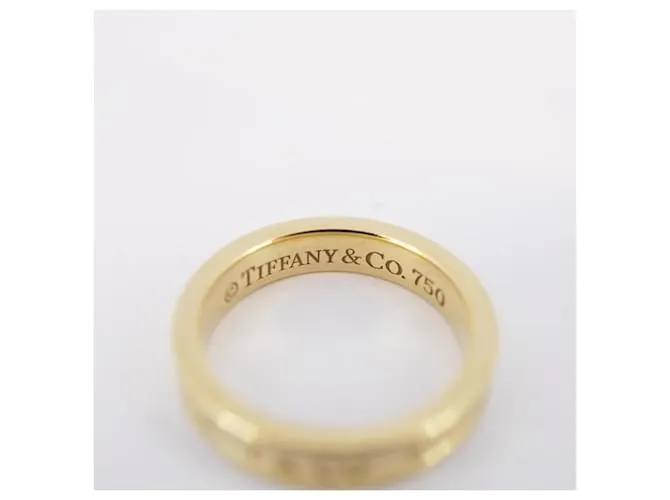 Tiffany & Co Anillo de banda estrecha en oro amarillo K18YG Tiffany 