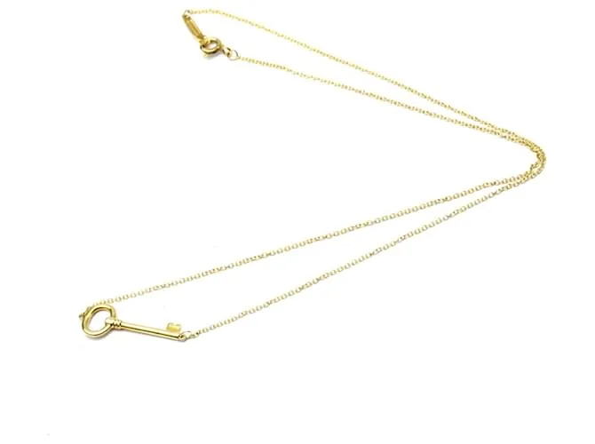 Tiffany & Co Collar llave ovalado Tiffany en oro amarillo Dorado 